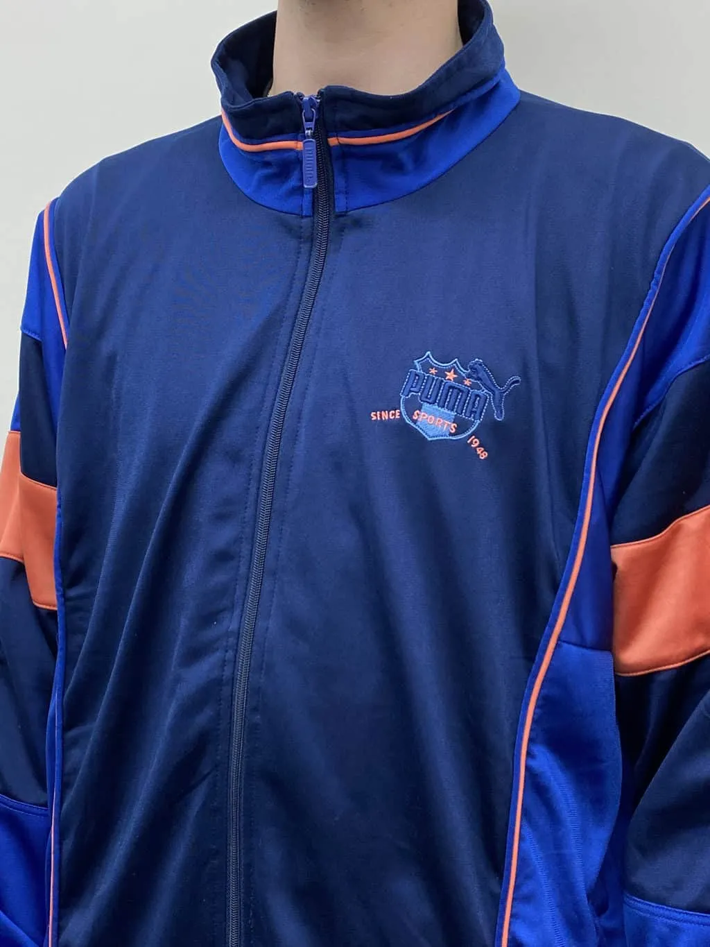 90s vintage mens puma sports jacket in navy, blue & orange – Large