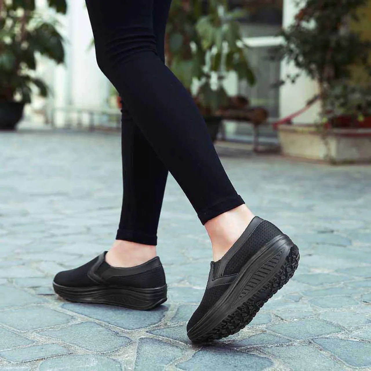 Black plain slip on rocker bottom shoe sneaker