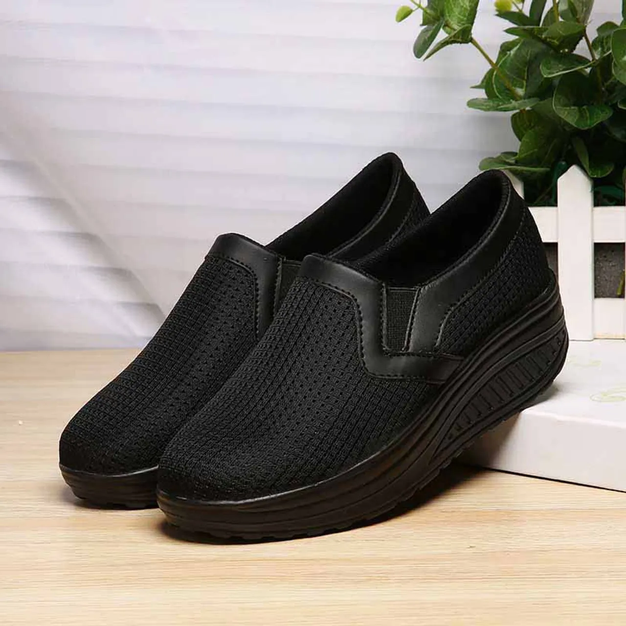 Black plain slip on rocker bottom shoe sneaker