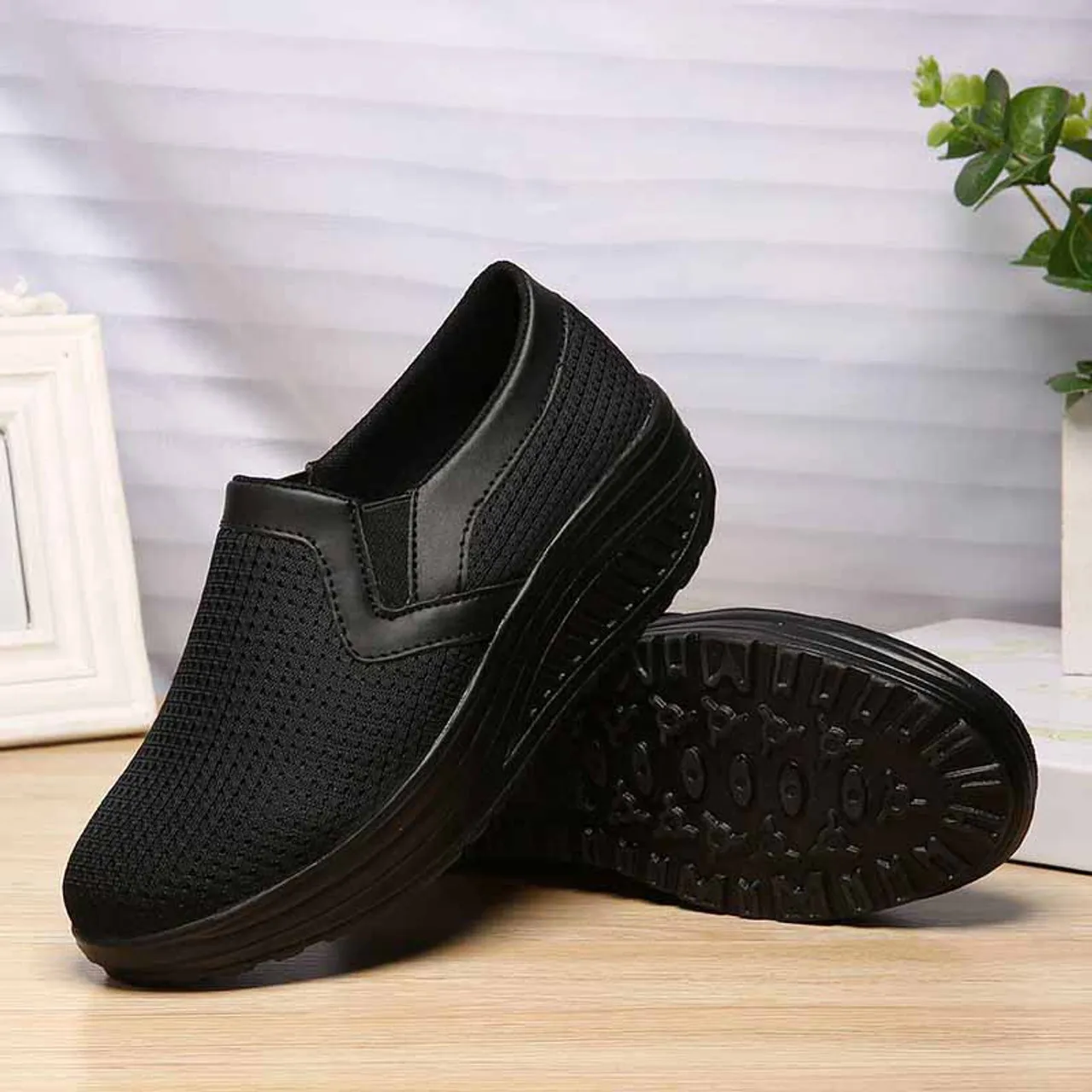 Black plain slip on rocker bottom shoe sneaker