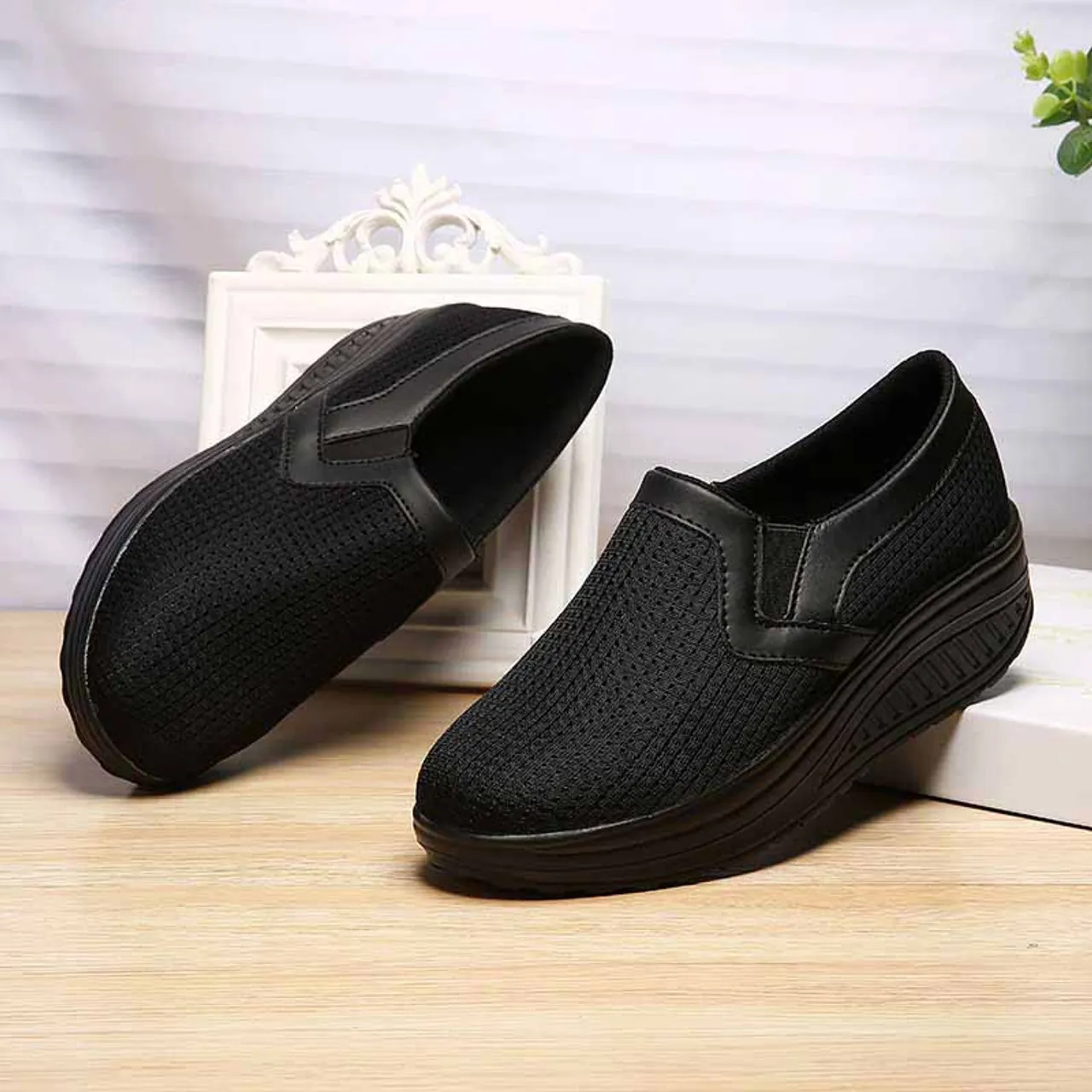 Black plain slip on rocker bottom shoe sneaker