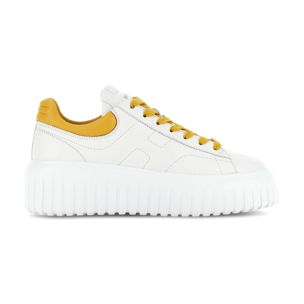 Sneaker in pelle bianca con suola in gomma spessa gialla