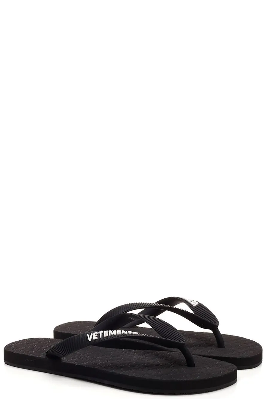 Vetements Logo Embossed Flip Flops